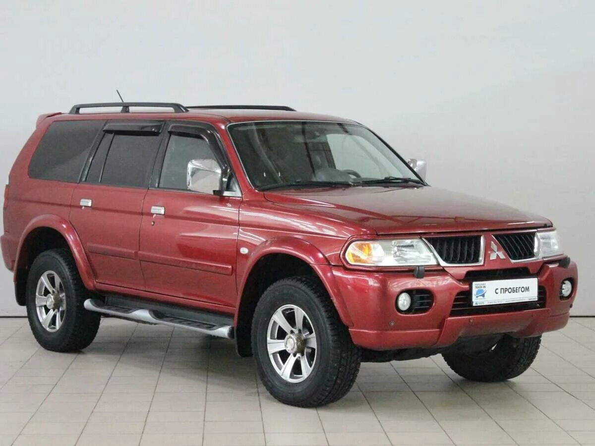 Мицубиси паджеро года выпуска. Mitsubishi Pajero Sport 1. Mitsubishi Pajero Sport 1 поколения. Mitsubishi Pajero Sport 2007. Mitsubishi Pajero Sport 2005 красный.