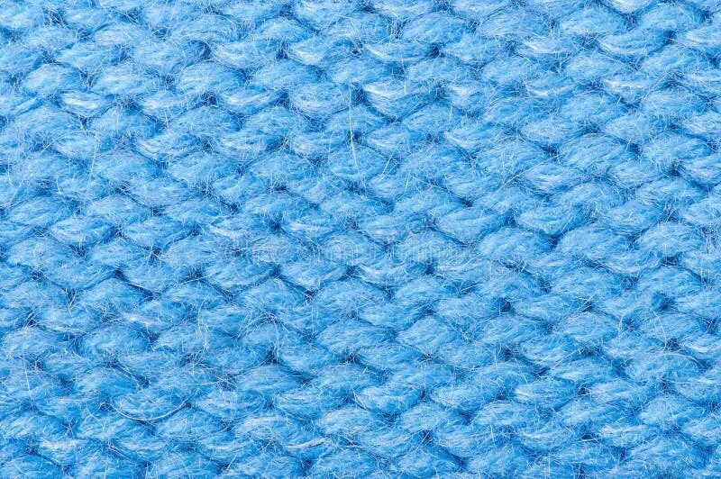 Пряжа синего цвета. Шерсть для вязания. Вязаная фактура. Синяя вязка. Синяя вязка.