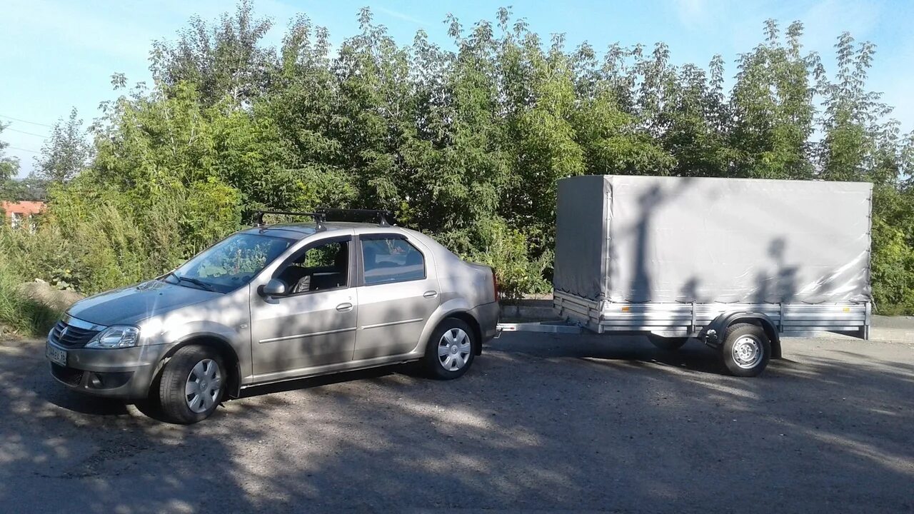 Рено Логан с прицепом 2.5. Renault Logan прицепом Renault Logan прицепом. Рено Логан 2 прицепы. Рено Логан 2010 с прицепом. Легковом авто межгород