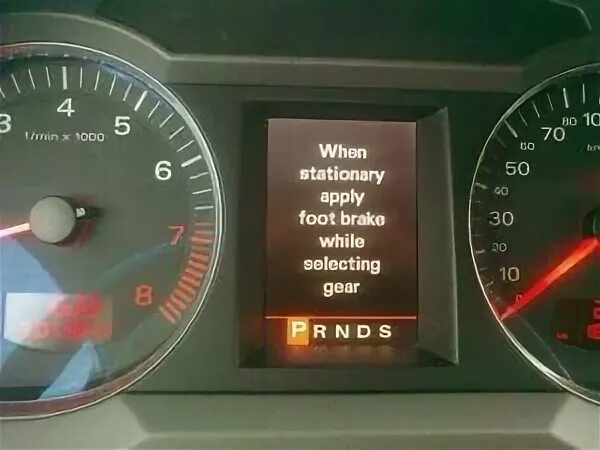When stationary apply foot brake while selecting. When stationary apply foot brake while selecting