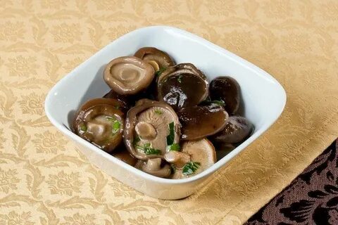 Зеленый маринованный гриб