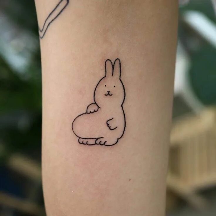 Bunny tattoo. Bunny tattoo. Тату зайцы на животе. Bunny tattoo. Парные тату кролики.