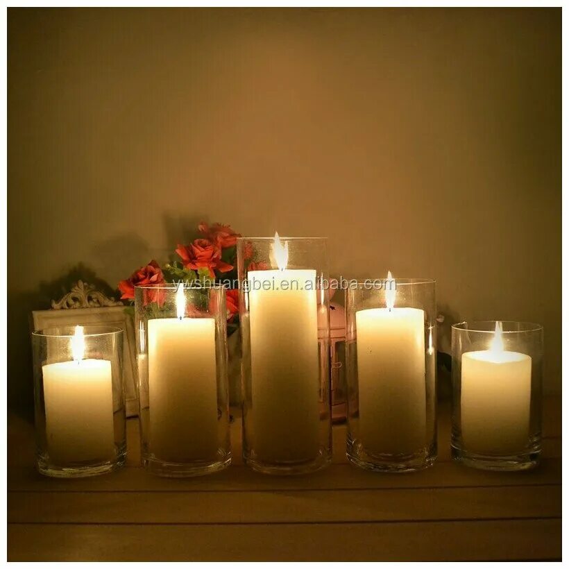 напольные насыпные свечи. подсвечник прозрачный. насыпные свечи. стеклянный подсвечник для свечей. свечи в стеклянных колбах.
