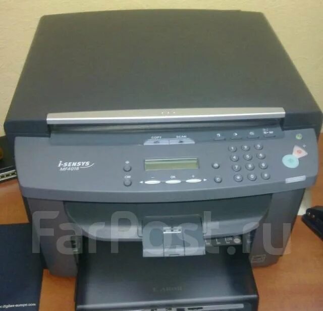 Мфу i sensys mf4018. Мфу canon 4018. canon i-sensys mf4018. принтер canon mf4018 3в1. принтер i-sensys mf4018.