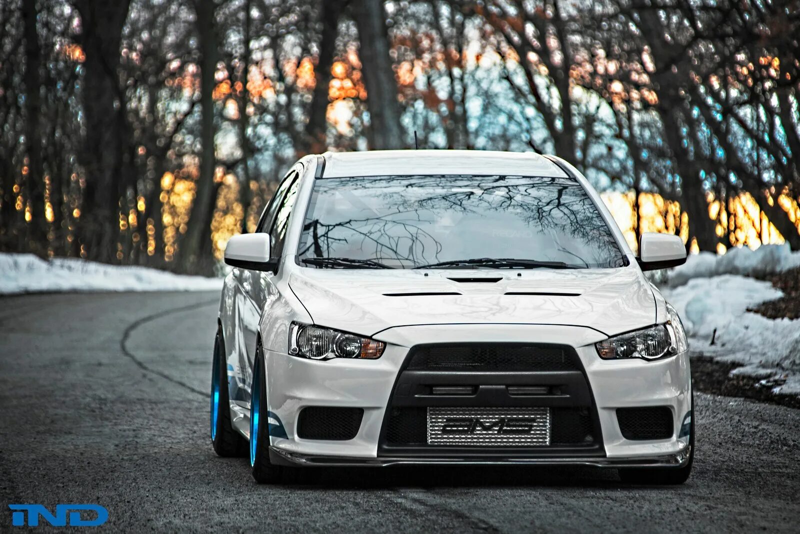 Lancer evo 10 rs. Mitsubishi evo 10. Мицубиси лансер эволюшн 10 панда. Lancer evo 10 rs. Advan evo 10.