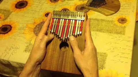 Игра на калимбе