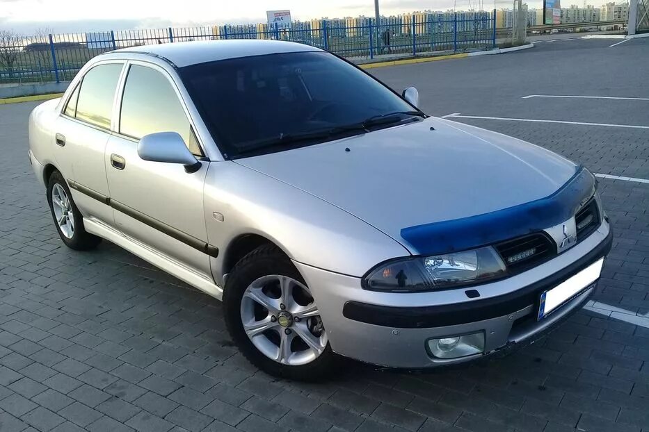 Мицубиси 2002г. Митсубиси Каризма 2002. Mitsubishi Carisma 2002 года. Митсубиси харизма 2002 года. Mitsubishi Каризма 2002 год.