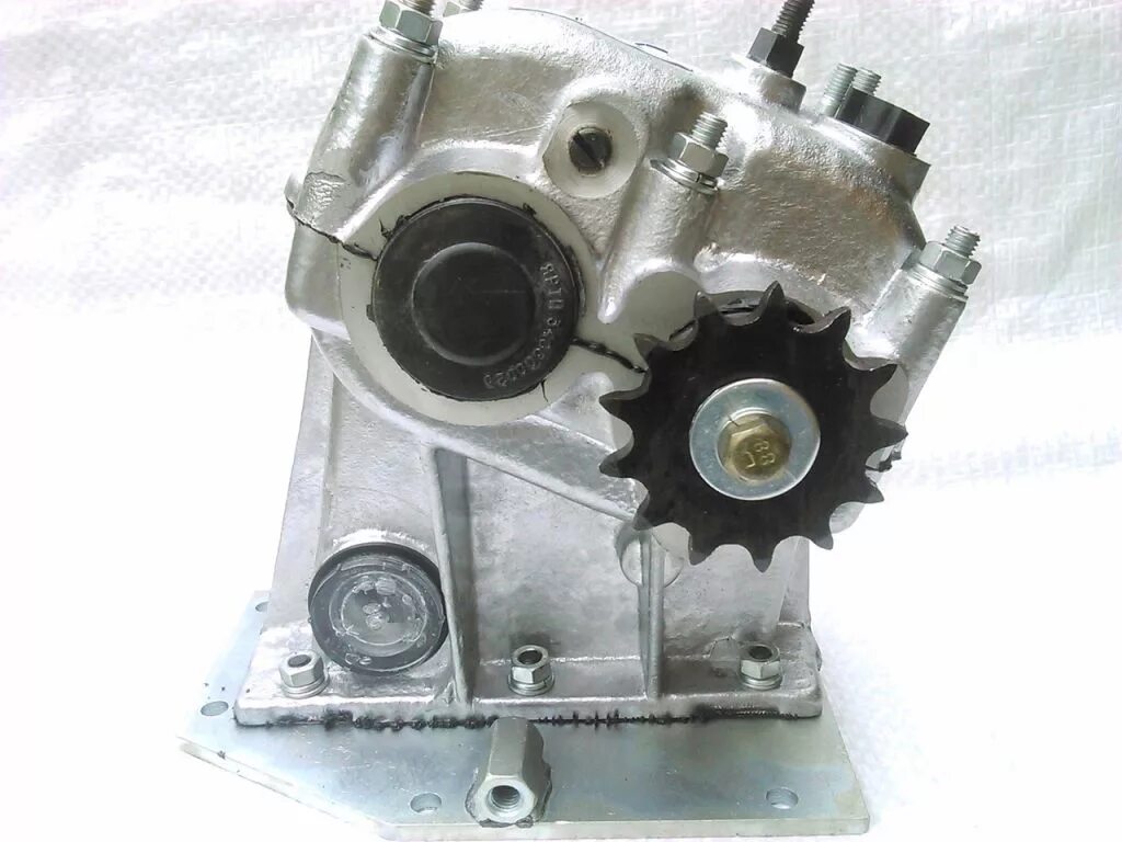 редуктор заднего хода для мотобуксировщика. редуктор заднего хода для мотобуксировщика. реверс редуктор на бурлак м 2. редуктор заднего хода для мотобуксировщика. реверс буран на мотобуксировщик.