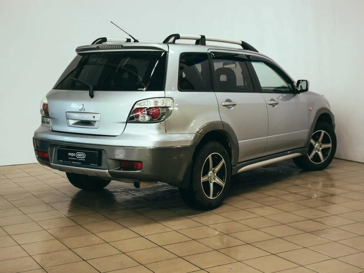 Mitsubishi Outlander 2004. Митсубиси Аутлендер 2004. Митсубиши Аутлендер 2004. Mitsubishi Outlander 2004 года. Мицубиси аутлендер 2004