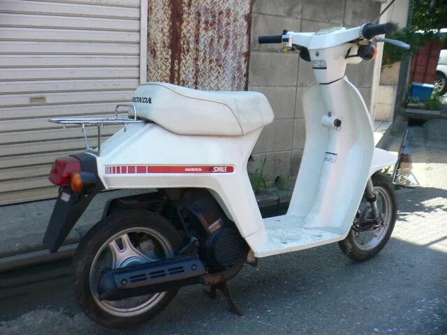Хонда еве пакс. Скутер honda eve smile. Honda eve. Honda eve. Honda eve smile.