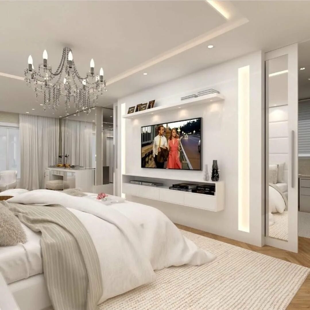 Телевизор перед кроватью. Интерьер спальни. Спальня в современном стиле. Красивые современные спальни. Телевизор в спальне.