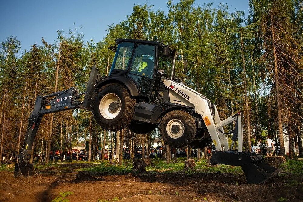 Terex tlb 825 rm. Экскаватор погрузчик терекс 825. terex tlb 825. umg погрузчик tlb 825. экскаватор погрузчик тлб 825.