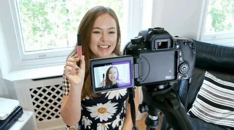 Vlogging vs Blogging: The Complete Run Down Plus Pros & Cons. woman pro...