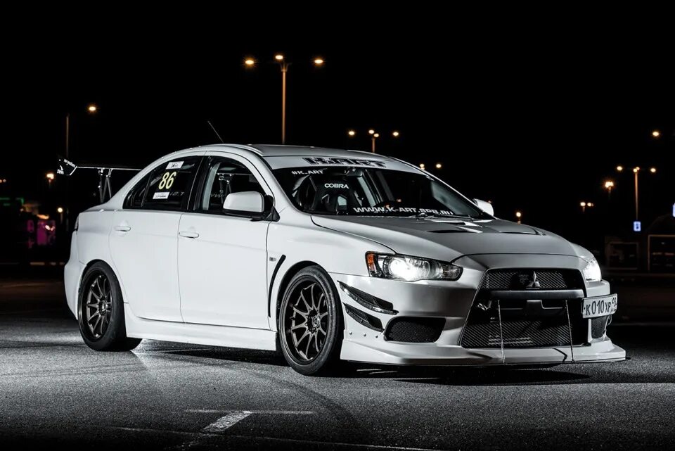 Mitsubishi evo x. Митсубиси Эволюшн 10. Lancer Evolution 10. Лансер 10 Эволюшн. Mitsubishi EVO 10.