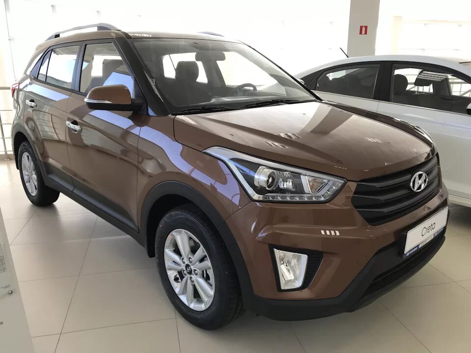 Hyundai Creta 2021 коричневый. Хендай Крета 1.6 коричневая. Хендай Гретта коричневая 2022. Коричневая Крета 2021. Комплектация travel