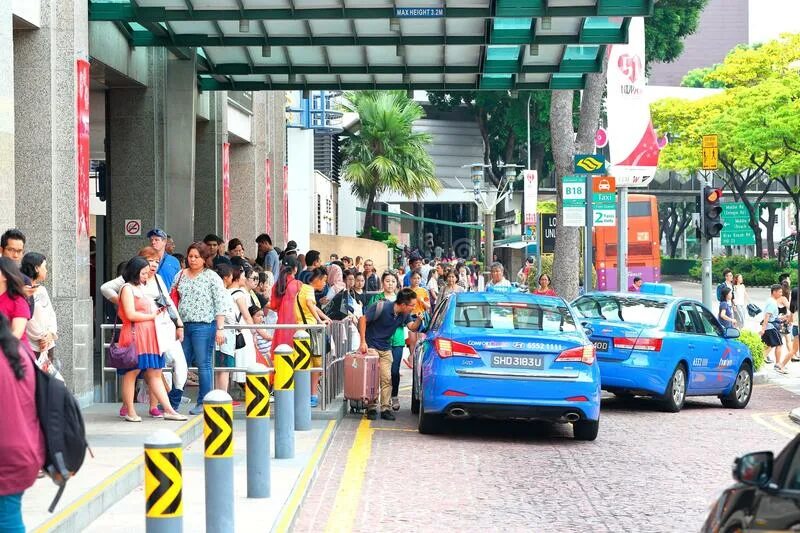Такси в сингапуре приложение. Сингапурское такси. Сингапурское такси. Singapore taxi. Такси в сингапуре.