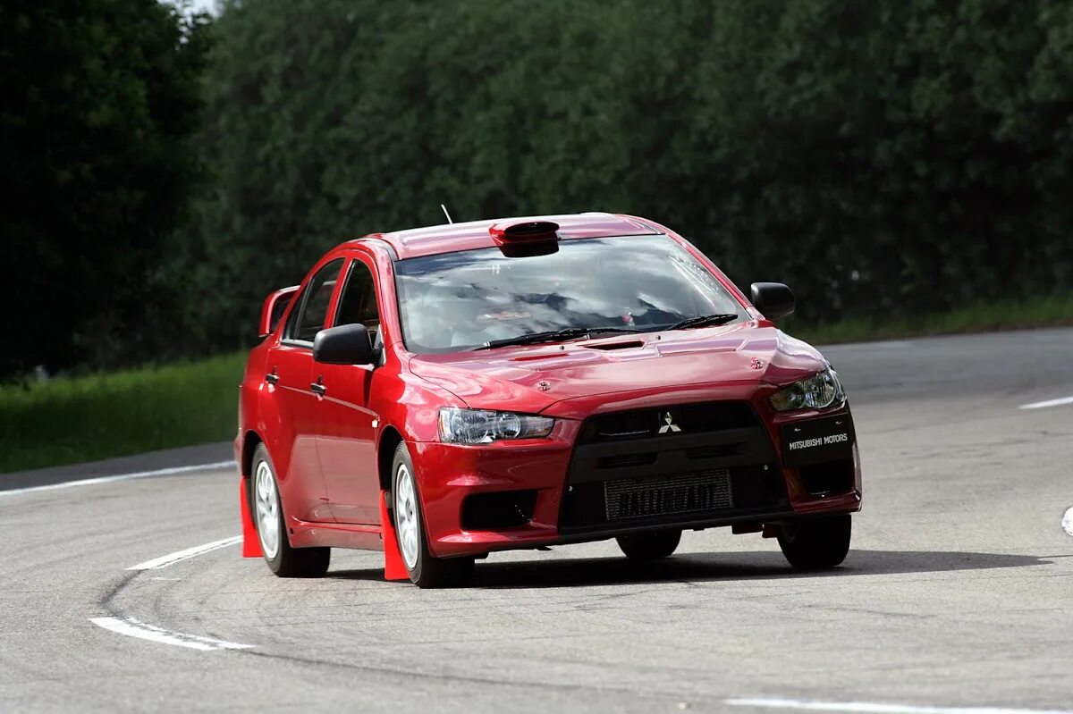 Лансер собран. Митсубиси Лансер 10 EVO. Митсубиси Лансер эволюшион10. Mitsubishi Lancer Эво 10. Mitsubishi Lancer Evolution x 10.