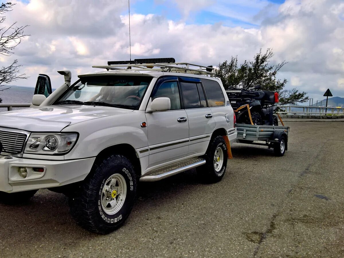 Tlc 100. Land cruiser 105 диски. Tlc 100 экспедиционник. ленд крузер 100 белый. ленд крузер 100 приморский край.