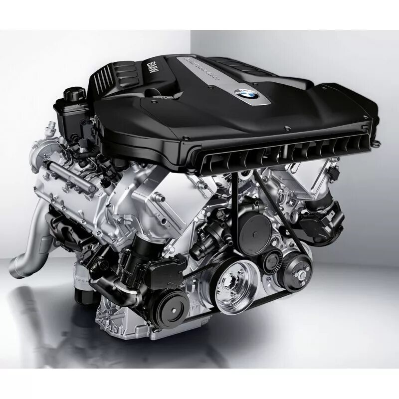 Новые двигатели бмв. Мотор БМВ s63b44a. Двигатели БМВ х5 v8. V8 BMW s63. Мотор BMW x5 f15.