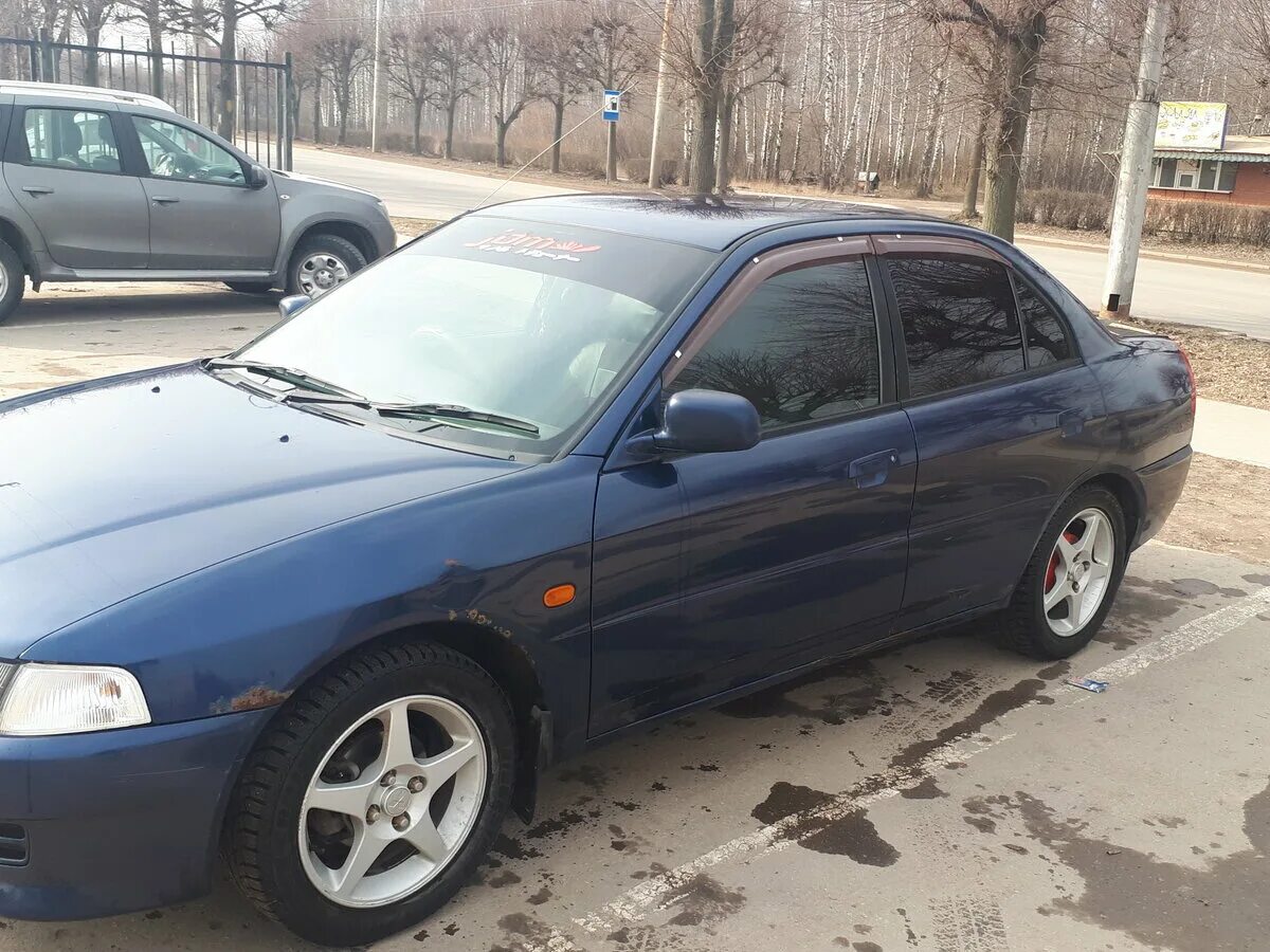 Мицубиси рязань. Mitsubishi Lancer VII 1998. Mitsubishi Lancer 1998. Митсубиси Рязань.