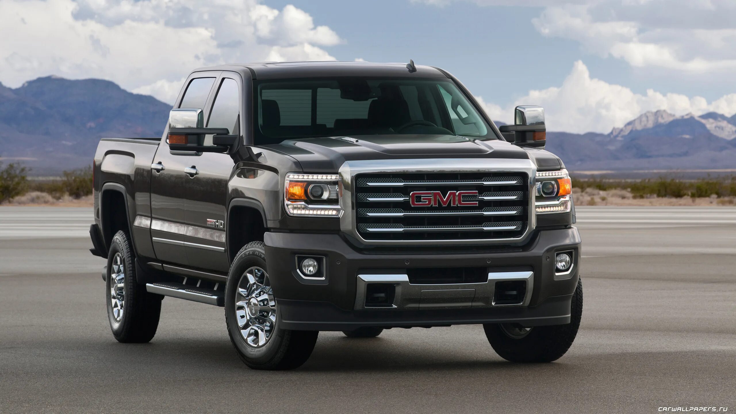 Автомобиль gmc. Автомобиль GMC Sierra 2500. GMC Sierra 2016. GMC Sierra 2014. Пикап GMC Sierra.