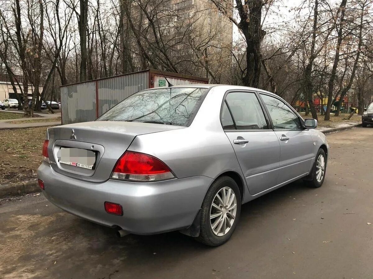 Mitsubishi lancer ix рестайлинг 2006. митсубиси лансер 9 1. 6. 6. лансер 9 лифтбек.
