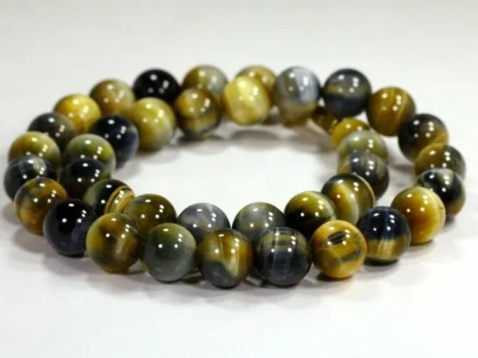 Тигрово-соколиный глаз. Соколиный глаз кому подходит по знаку. Кварц соколиный глаз камень. Соколиный глаз кому подходит по знаку. Петерсит соколиный глаз.