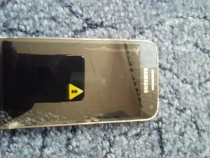Samsung желтый треугольник