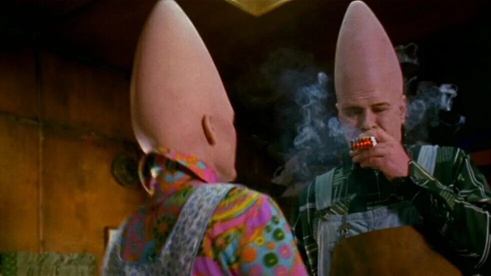 дэн эйкройд яйцеголовый. яйцеголовые кармин. яйцеголовый остров. яйцеголовый остров. яйцеголовые фильм 1993.