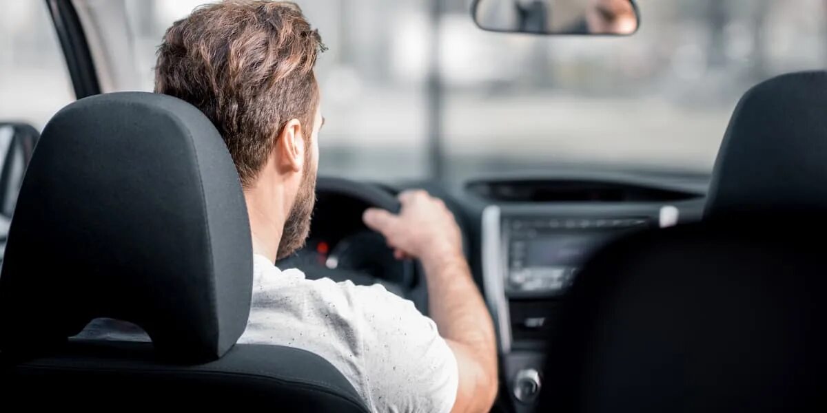 Man on back car. Car Driving Rear view. Sad man Driving. A man is Driving a White car. Driver back