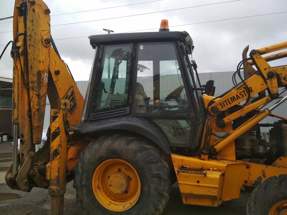 Погрузчик jcb бу. JCB 3cx 2000. JCB 3cx 2000 года. JCB 2000г. Экскаватор погрузчик бу.