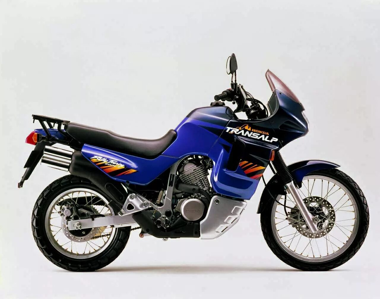 Мотоциклы honda transalp. Хонда трансальп 650 черный. Honda xl650 transalp. Фара honda xl 600 1996. Мотоцикл honda transalp 600.