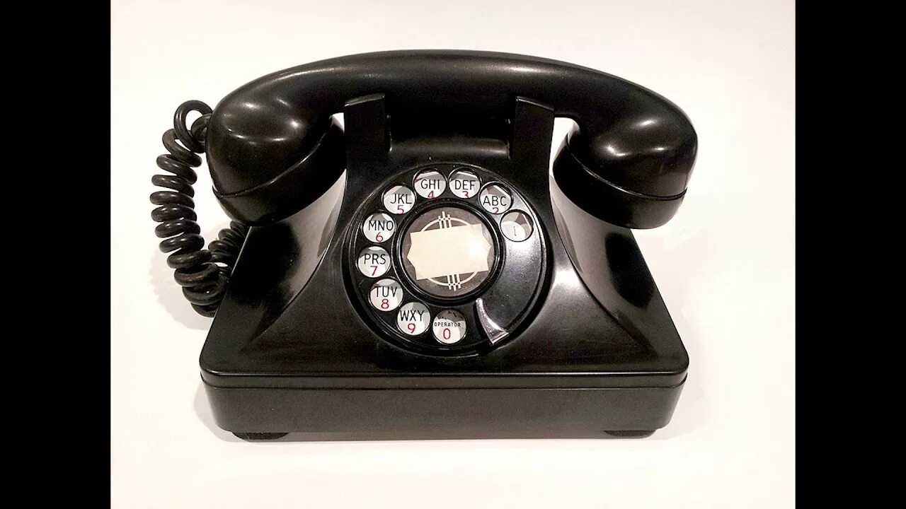 Копии старых телефонов. Старинный телефонный аппарат. Старый телефон. Старинный черный телефон. Старый черный телефон.