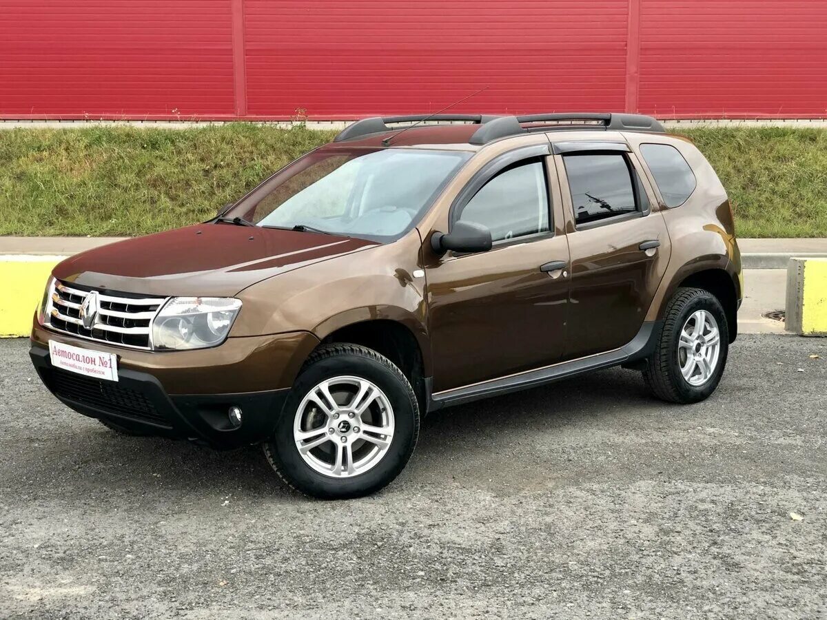 Рено дастер 2014 г в. Рено Дастер 2014. Renault Duster 2014. Renault Duster коричневый. Рено Дастер 2013 года коричневый.