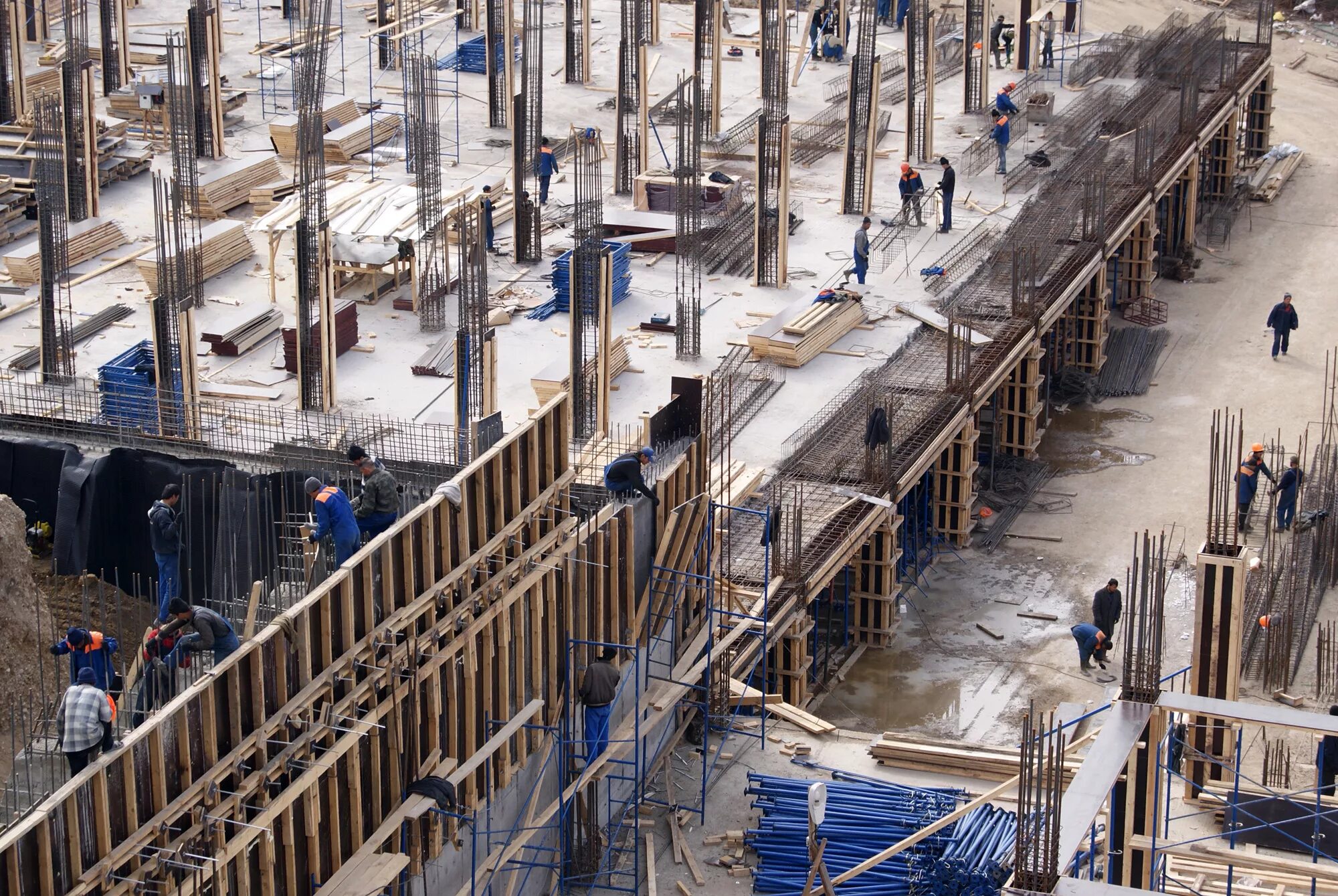 Технология строительства зданий. Монолитные конструкции. Сборка металлоконструкций. Строительный объект. Строительный проект.