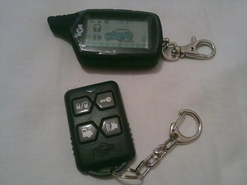 Сигнализация 1998 года. Кгб сигнализация с автозапуском 2010 года. брелок kgb fx-1. ug29-1 модель сигнализации кгб. сигнализация с автозапуском кгб т1-5.