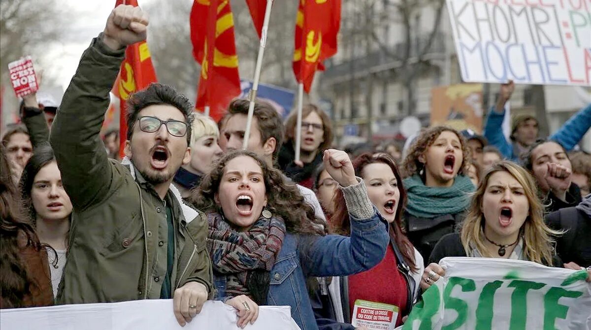 Небольшая группа людей для выражения протеста. Huelga.