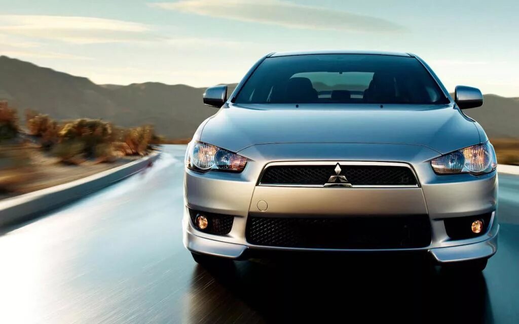 Мицубиси производитель. Lancer 10. Митсубиси Лансер. Лансер 10 поколения. Mitsubishi Lancer cy3a.