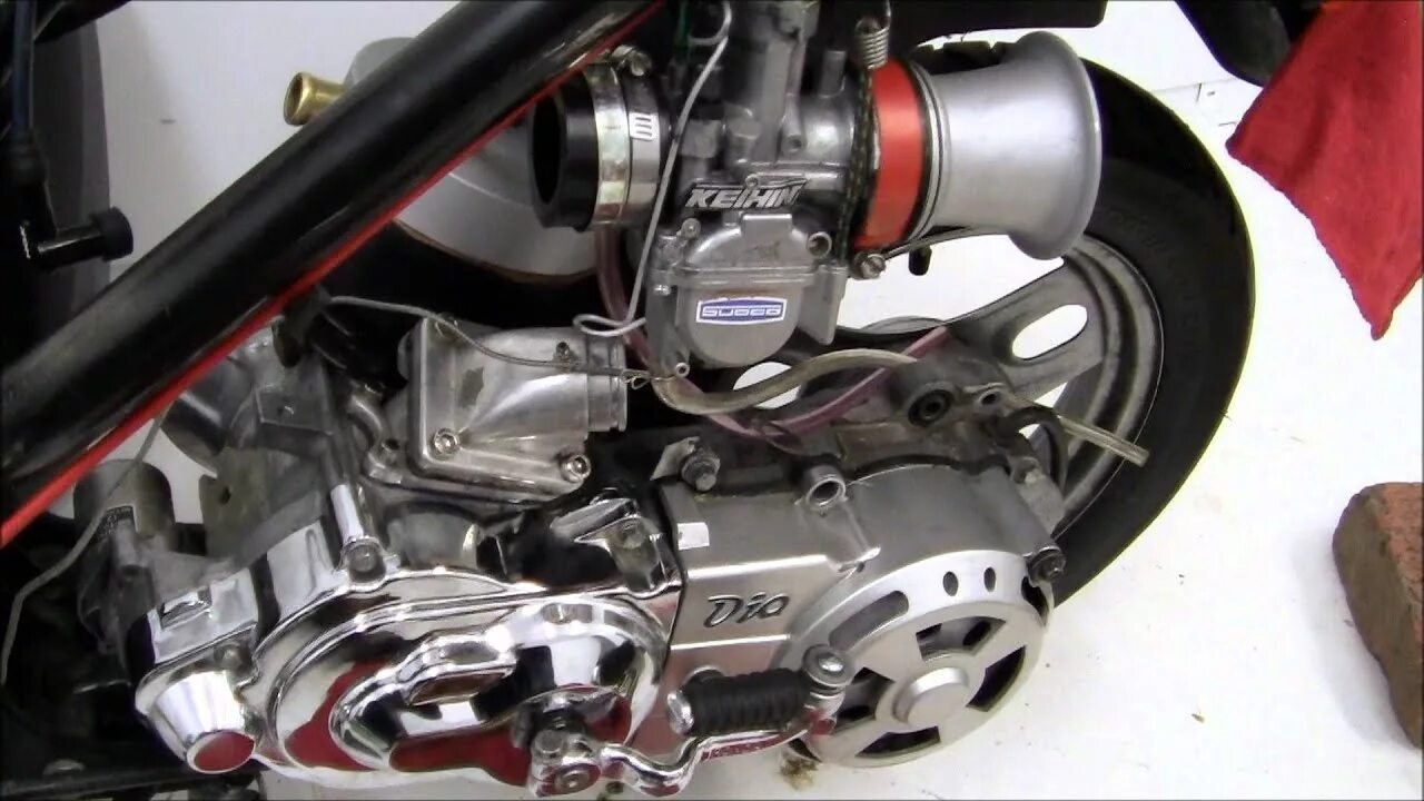 Хонда дио какой двигатель. Двигатель Honda Dio 2т. Двигатель скутера Хонда дио. Двигатель дио 27. Хонда дио 27.