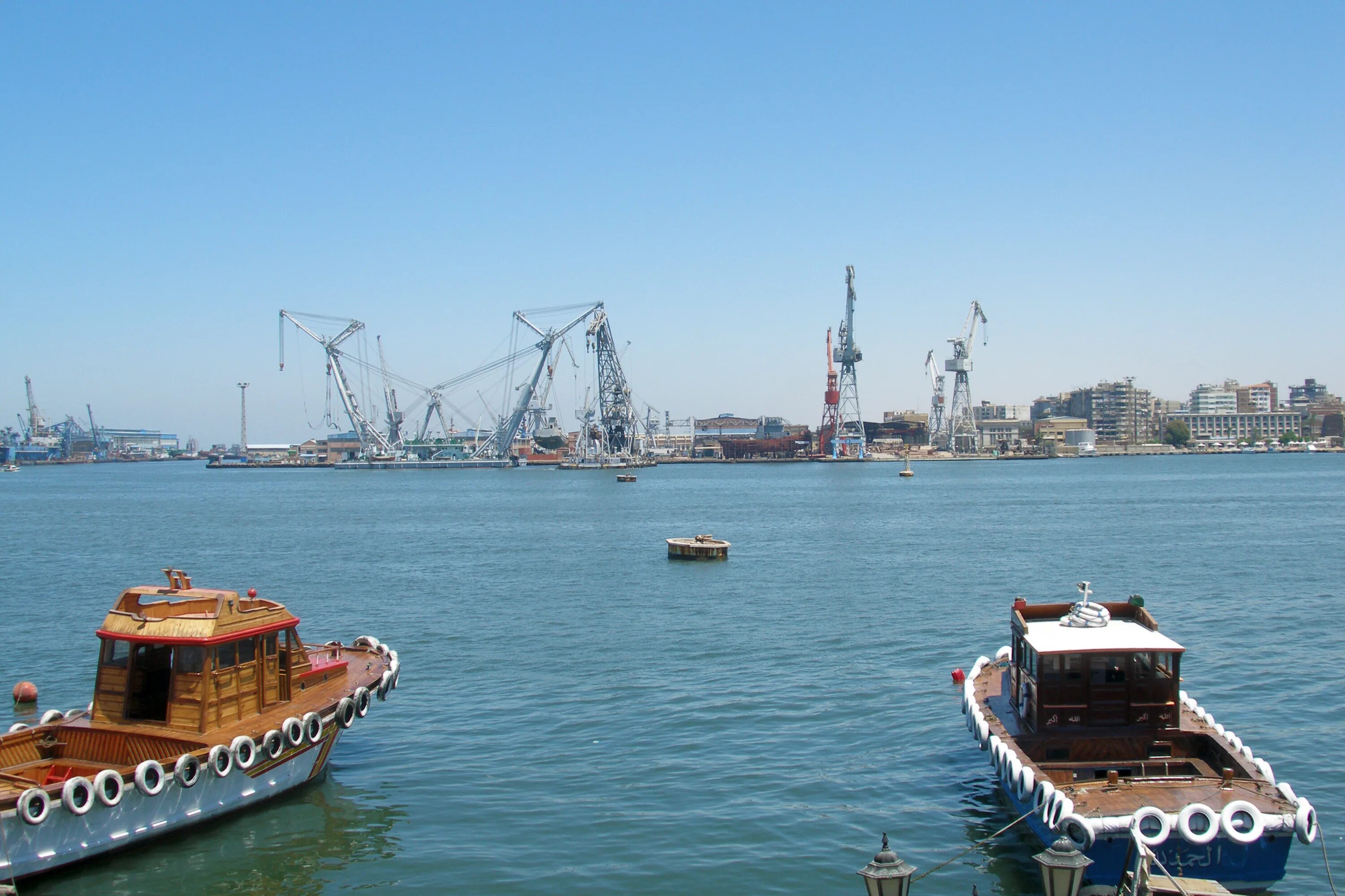 Суэцкий канал порт-Саид Египет. Порт Саид арки. Порт Саид корабль дорогие. Порт Саид пейзажи города.