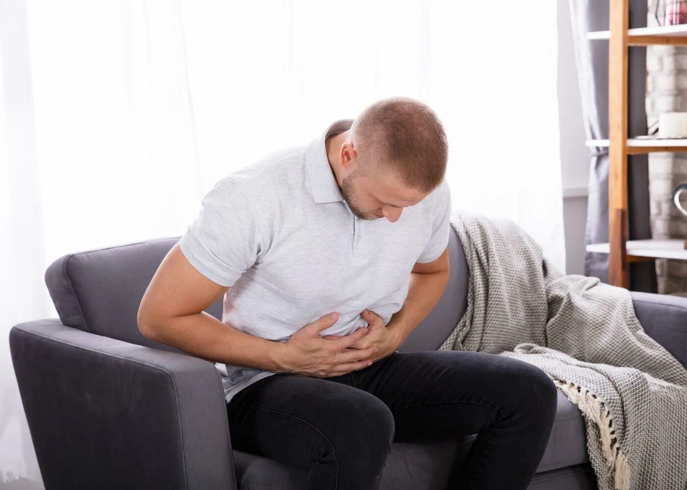 Болит живот от энергетика. Человек с болью в животе рисунок. Digestive problems. Боль в животе гиф. Человек с болью в животе.