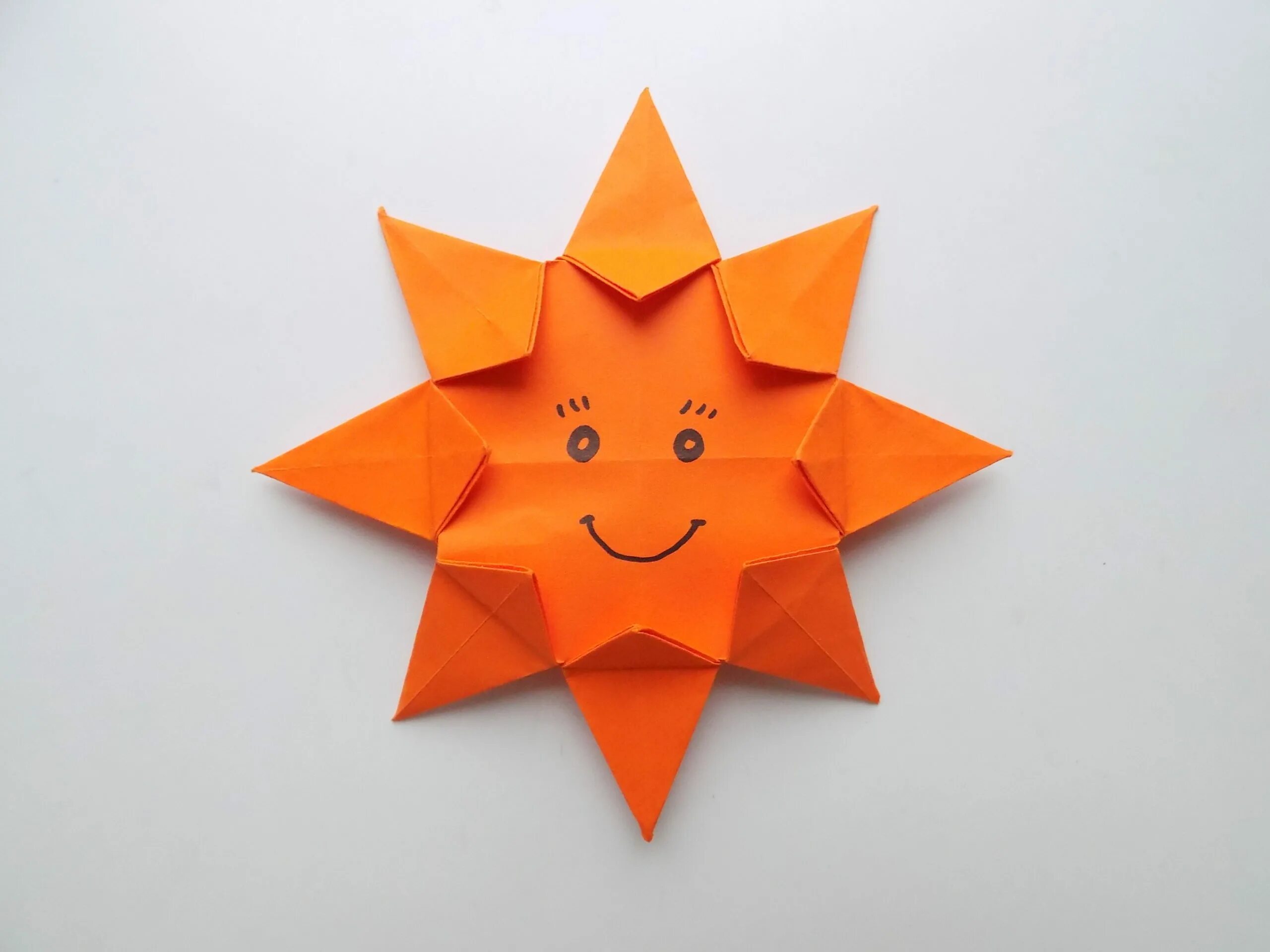 Оригами солнышко. Оригами солнце. Оригами солнце из бумаги. Солнце оригами для детей.
