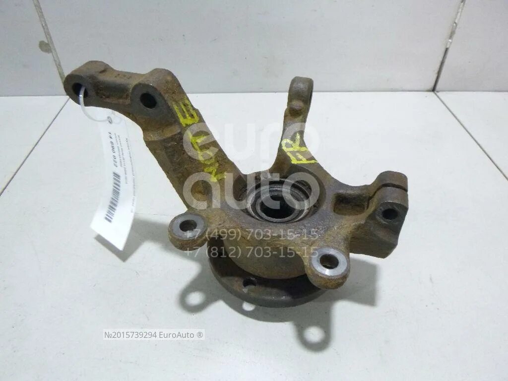 Nissan Note кулак поворотный 40014ax600. Поворотный кулак Nissan Note e11. Кулак поворотный Ниссан ноут е11 левый. Поворотный кулак Ниссан ноут 1.4 е11.