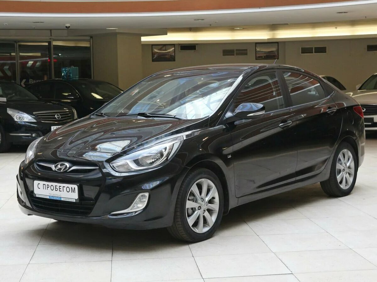 Хендай солярис 2010. Hyundai Solaris 1. Hyundai Solaris 2010 черный. Hyundai Solaris 1 поколение черный. Hyundai Solaris 2011 седан.