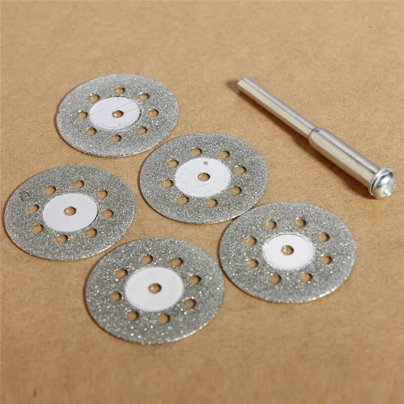 Алмазный диск на бор машинку. Dremel diamond disk. Круг отрезной алмазный dremel. Диск алмазный отрезной 77x11. Абразивное колесо с алмазной крошкой.