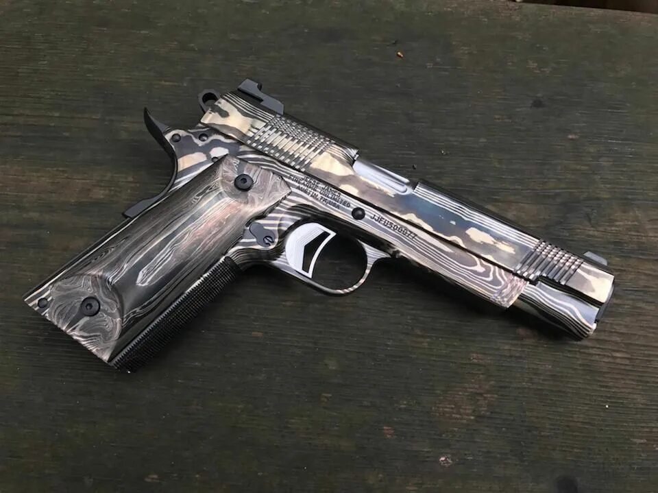 Gun steel. Кольт 1911 Кобра. Кольт 1911 из метеорита. Jesse James firearms 1911. Самые дорогие Кольт 1911 из метеорита.