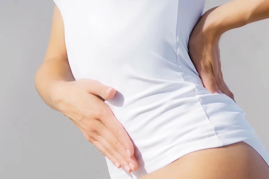 Вагинальный кандидоз (молочница). Молочница у женщин симптомы. Боли в животе у женщин. Боль в пояснице у женщин отдающая в живот. Перед месячными может быть жжение.