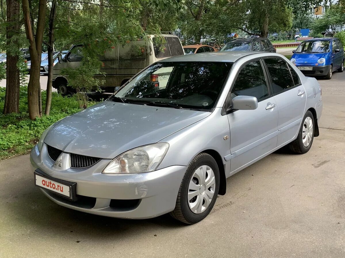 Mitsubishi lancer 2005. Митсубиси Лансер 2005. Mitsubishi Lancer IX 2005. Лансер 9 2005.