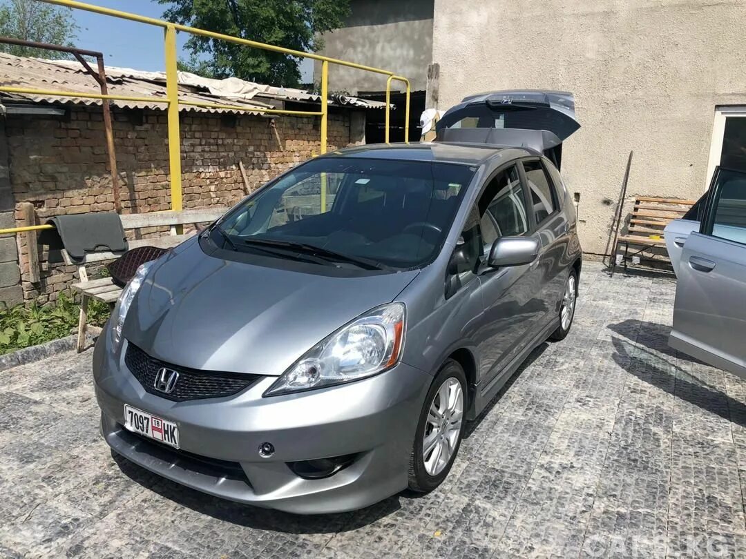 Хонда фит 1.5 автомат. Хонда фит 2010. Honda Fit 2010 левый руль. Honda Fit 1.5 2010 года.