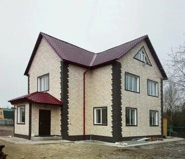Отделка фасада дома фасадной панелью